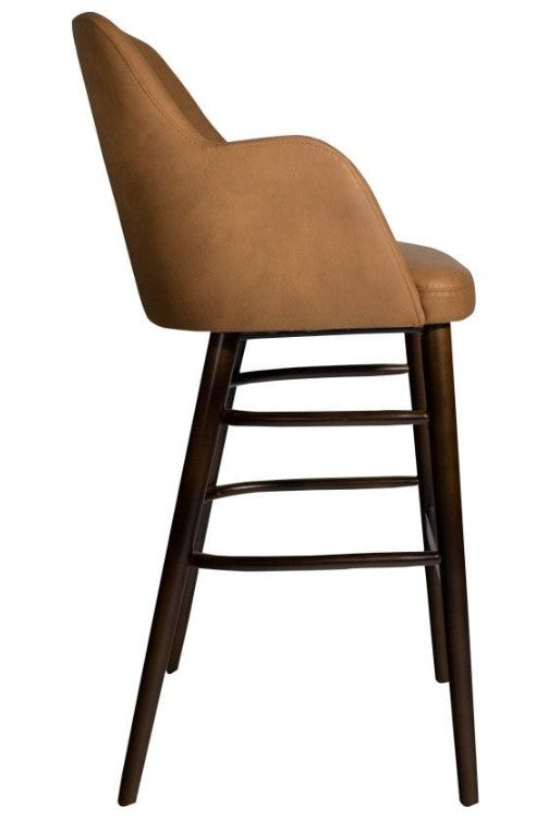Side view of Aztec Bar Stool LegsN109 CognacVintageElegance Faux Leather featuring a warm cognac faux leather upholstered seat and dark wood legs designed for commercial interiors and hospitality settings.