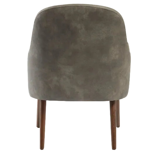 Back view of the Aztec Lounge Arm Chair - Steel Grey, featuring a smooth curved backrest and slender wooden legs, designed for comfort and style in commercial interiors.