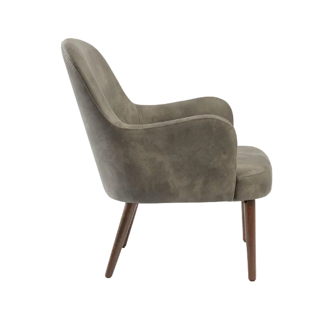 Side view of an Aztec Lounge Arm Chair - Steel Grey featuring smooth upholstery and angled wooden legs, designed for comfort and style in commercial interiors.