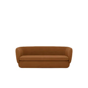 Carter Collection Sofa featuring caramel brown mohair-style velvet upholstery made from 100% recycled PET yarns, soft curved lines, low-profile backrest, and retro-inspired styling for hotels, reception areas, lounges, boutique hospitality venues, and commercial interiors. Brown sofa on a white background