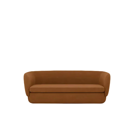 Carter Collection Sofa featuring caramel brown mohair-style velvet upholstery made from 100% recycled PET yarns, soft curved lines, low-profile backrest, and retro-inspired styling for hotels, reception areas, lounges, boutique hospitality venues, and commercial interiors. Brown sofa on a white background