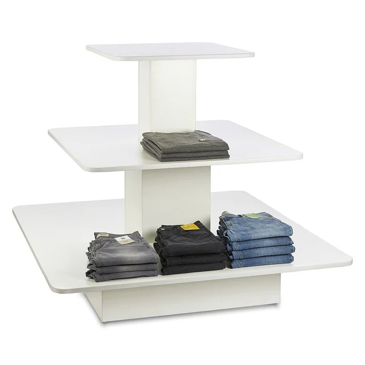 Silhouette 3-Tier Square Island Display Gondola in white with folded clothing on shelves