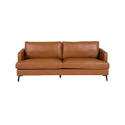 Jasper 3 Seater Crib 5 Sofa in Tan with upholstered seat and back cushions, black powder-coated metal legs, and contemporary commercial design for hotels, lounges, offices, and hospitality spaces. Brown leather sofa on a white background 