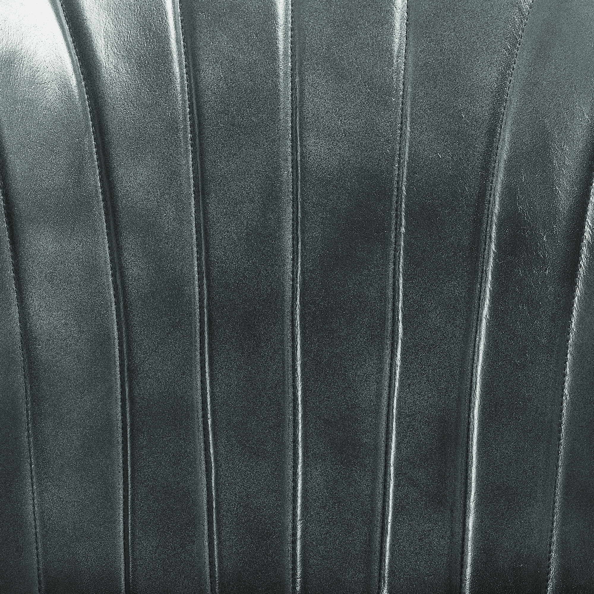 Close-up detail of the vertical stitching on the backrest of the Lars Side Chair - Genuine Steel Grey Leather, showcasing the smooth texture and sophisticated finish.