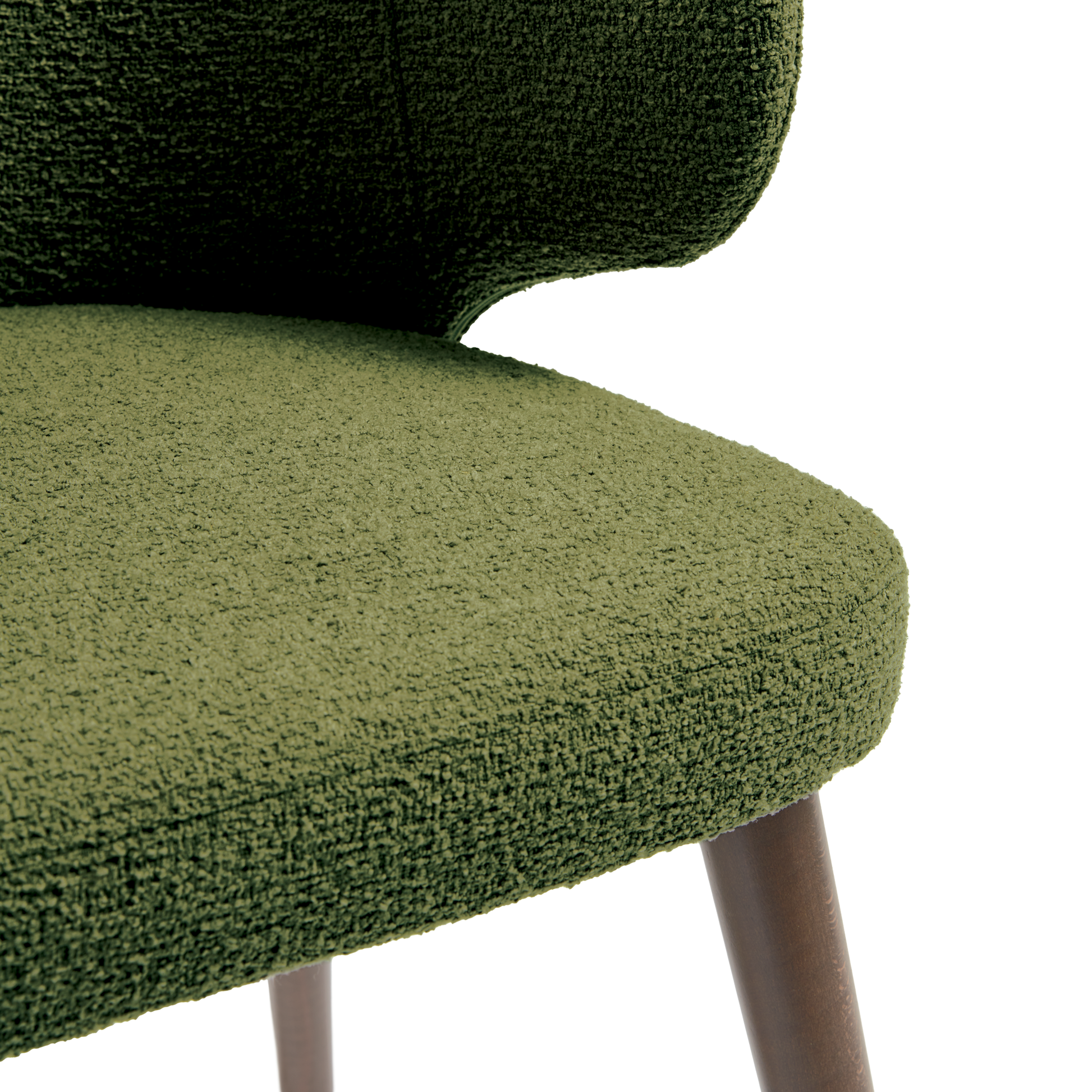 Close-up of textured upholstery and wooden legs on the Selma Armchair - Forest Green, showcasing its durable fabric and elegant design.