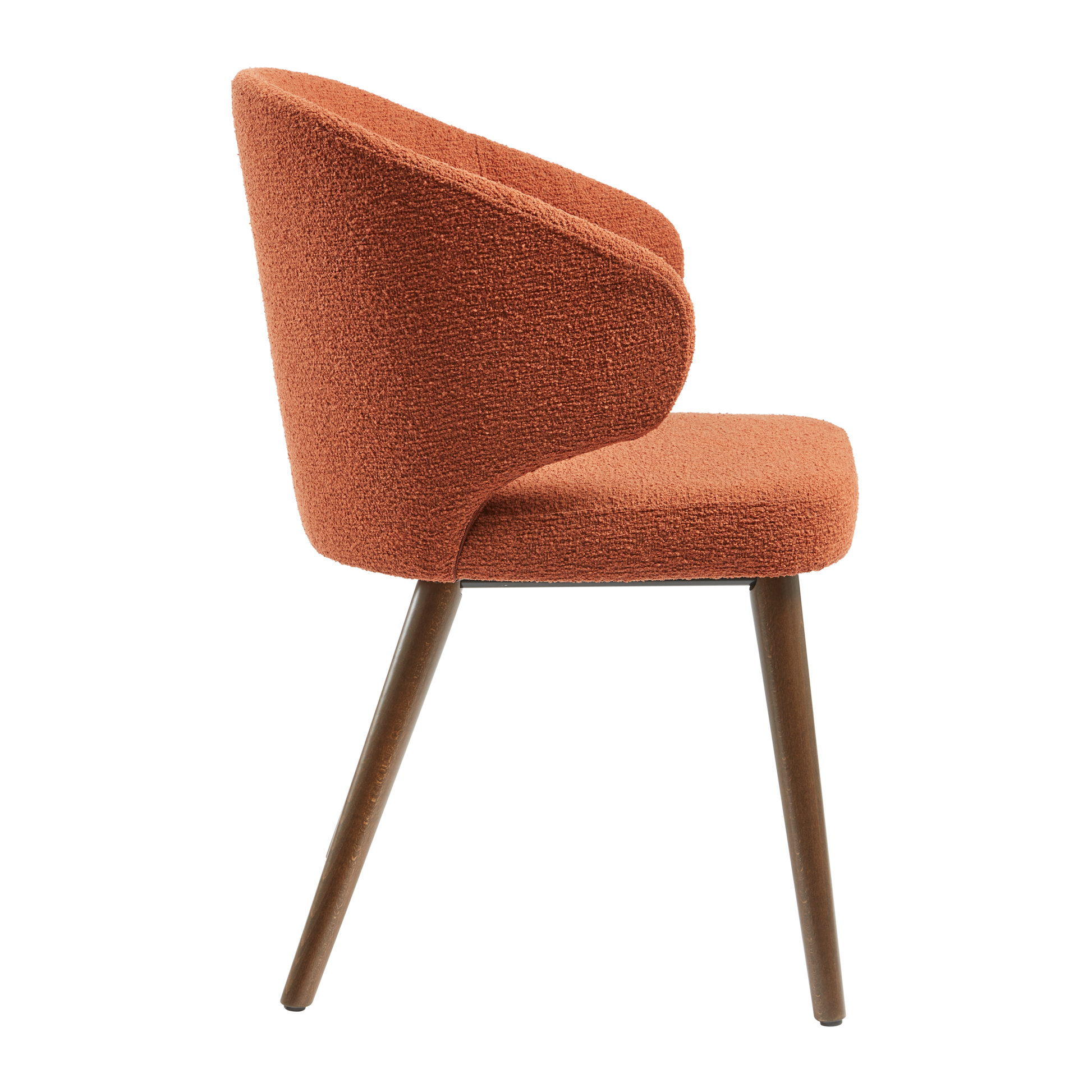 Selma Armchair - Terracotta featuring a modern curved design, textured upholstery, and sleek wooden legs, ideal for stylish commercial interiors and hospitality settings.