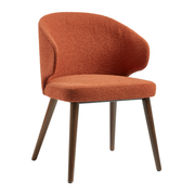 Selma Armchair - Terracotta with curved backrest and textured upholstery on slim wooden legs, designed for comfortable and stylish seating in commercial interiors.