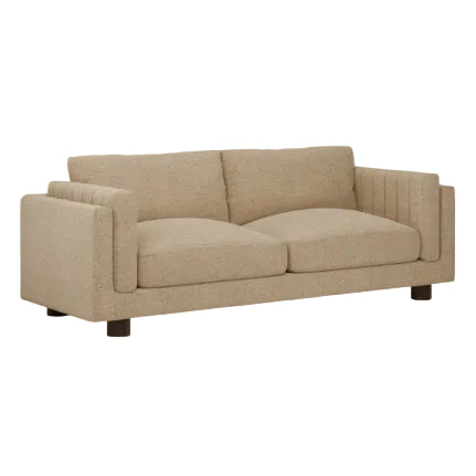 Halton 3 Seater Sofa upholstered in speckled latte brown bouclé fabric, featuring deep cushions, curved arms, and a contemporary design for hotel lounges, reception areas, and hospitality interiors. Beige sofa on a plain background