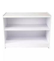 White solid retail counter with integrated storage shelf