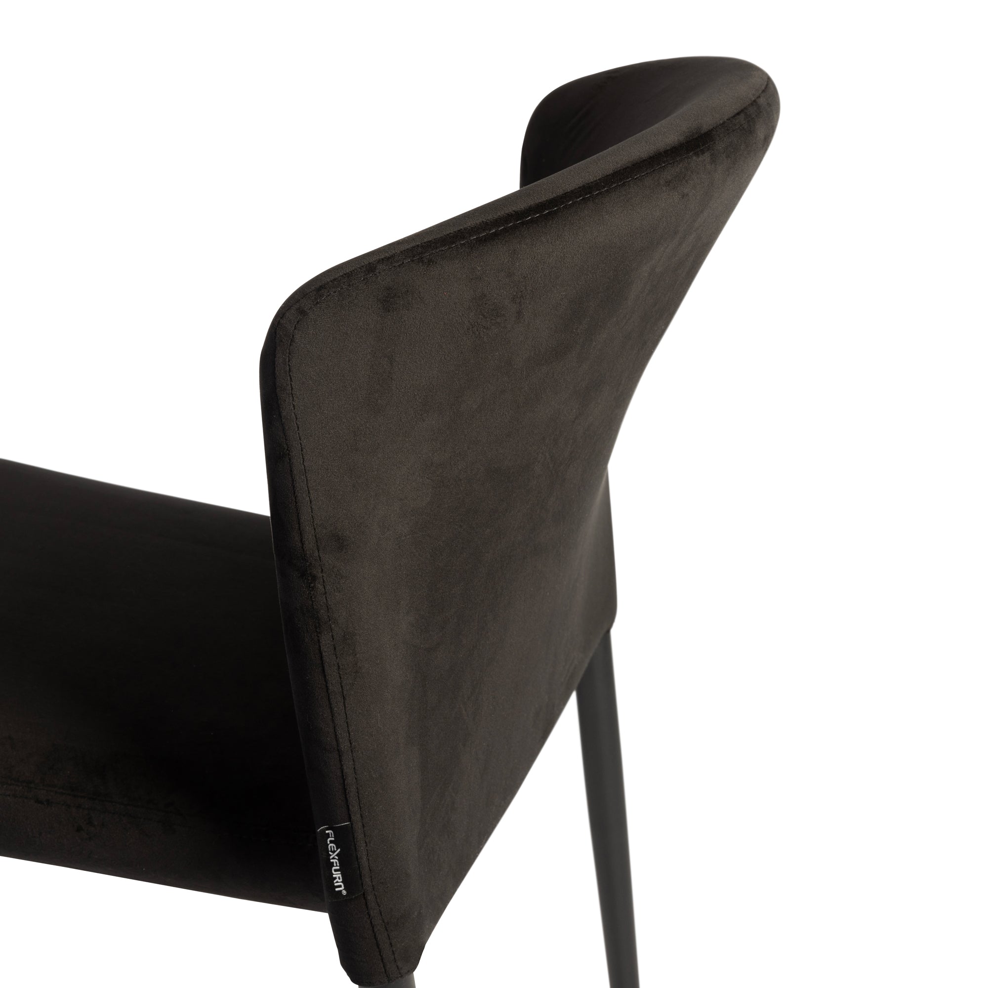 Close-up view of the backrest and seat of the Veneto Stacking Side Chair - Black Velvet, highlighting its smooth black velvet upholstery and sleek design.