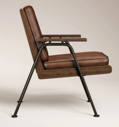 Witham Accent Chair featuring durable brown faux leather upholstery, walnut-stained ash wood armrests, and an industrial-style black metal frame, perfect for hotels, reception areas, workplace breakout spaces, lounges, cafés, and commercial interiors.