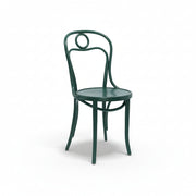 Green metal chair on a white background